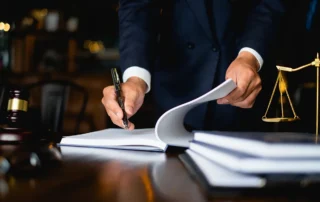 Lawyer Writing In Book